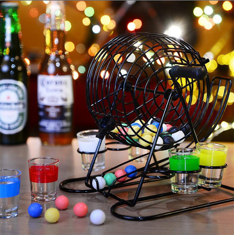 Bingo lottery machine on a tabletop with a full set of colored balls and multiple cups