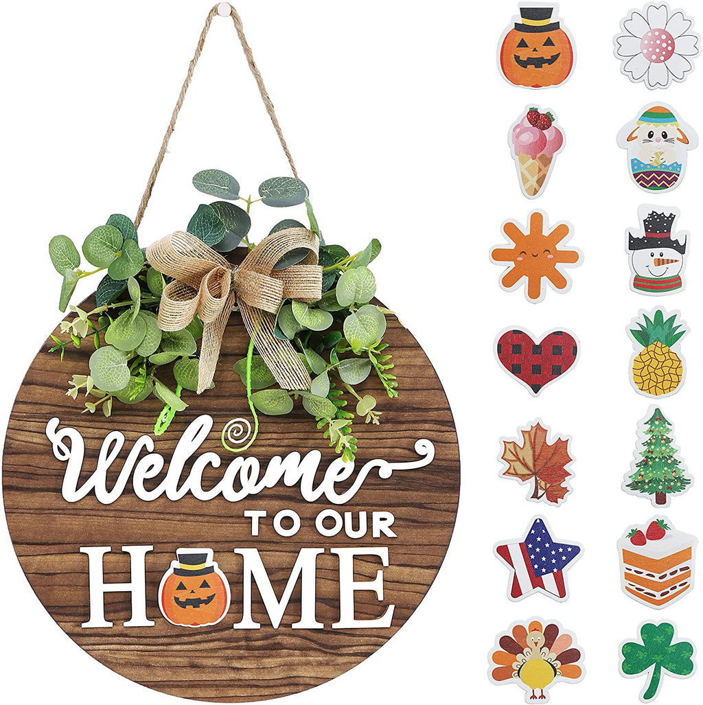 Rundes Holz-Willkommensschild in dunkler Holzmaserung mit Eukalyptuskranz und „Welcome“