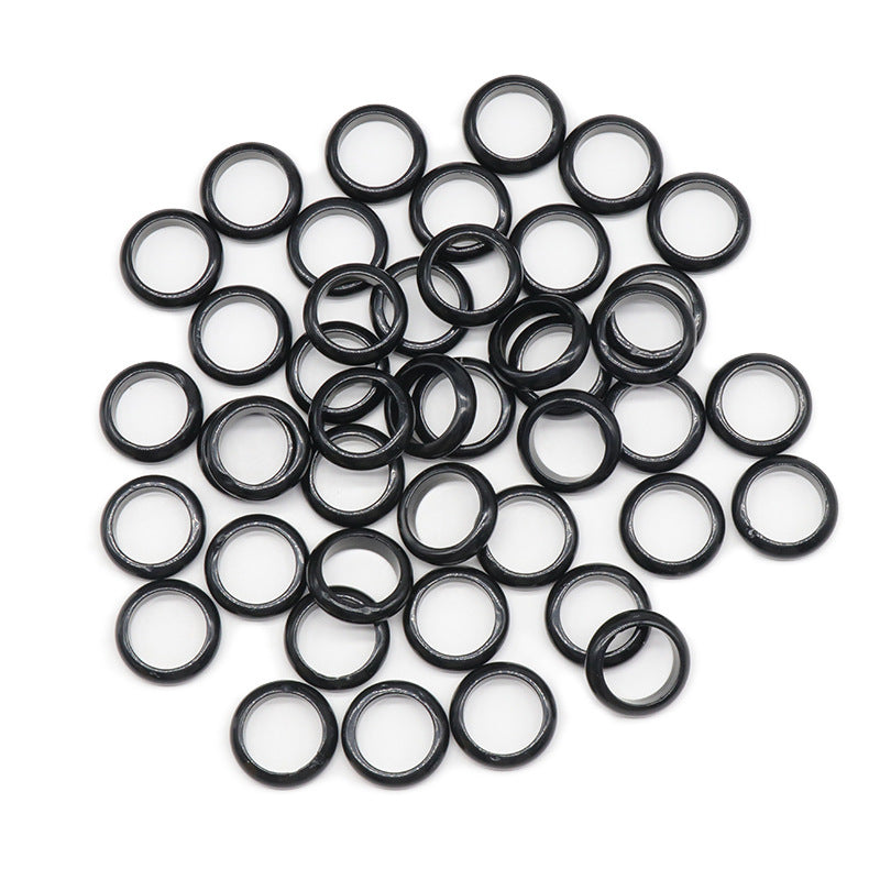 Black agate running rings, dark translucent bands with silver-toned edges