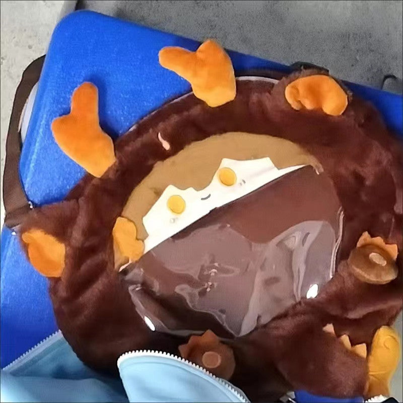 Blue plush dragon bag with zipper opening and brown plush interior lining