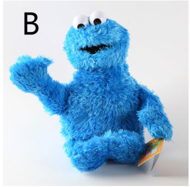 Blue Elmo plush doll with big eyes and fuzzy blue fur, sitting pose