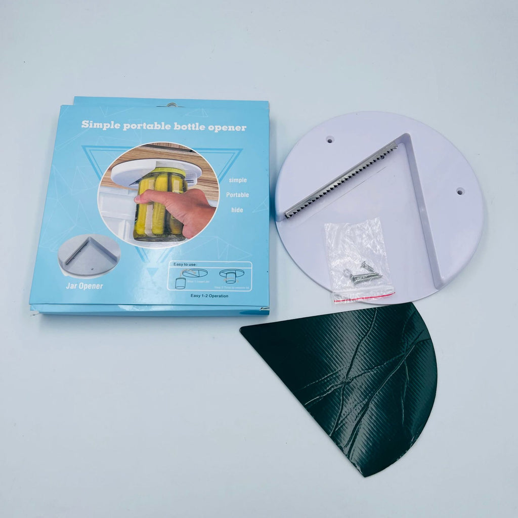 Jar and bottle opener kit with white opener base, serrated blade, and green piece