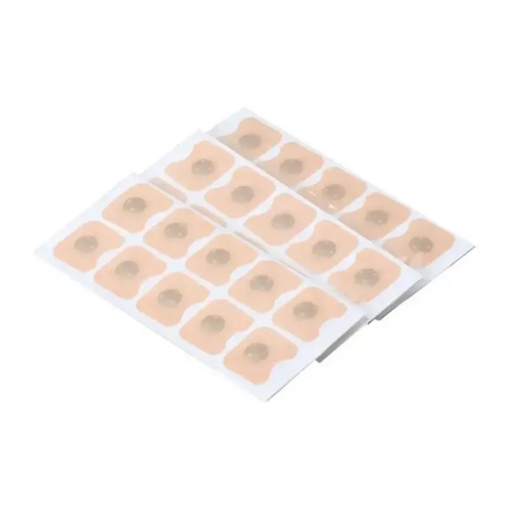 Breathe Easy Nasal Dilators adhesive nose patches on sheet, circular pads.