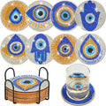 8 diamond coasters with blue/gold eye and hamsa designs on stand