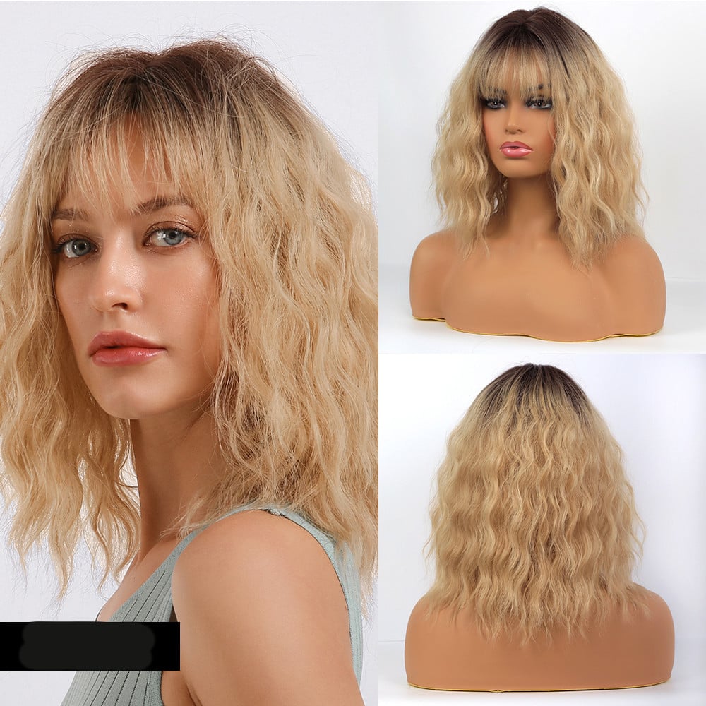 Front view of short curly wig: blonde/gold fringe with soft, layered waves