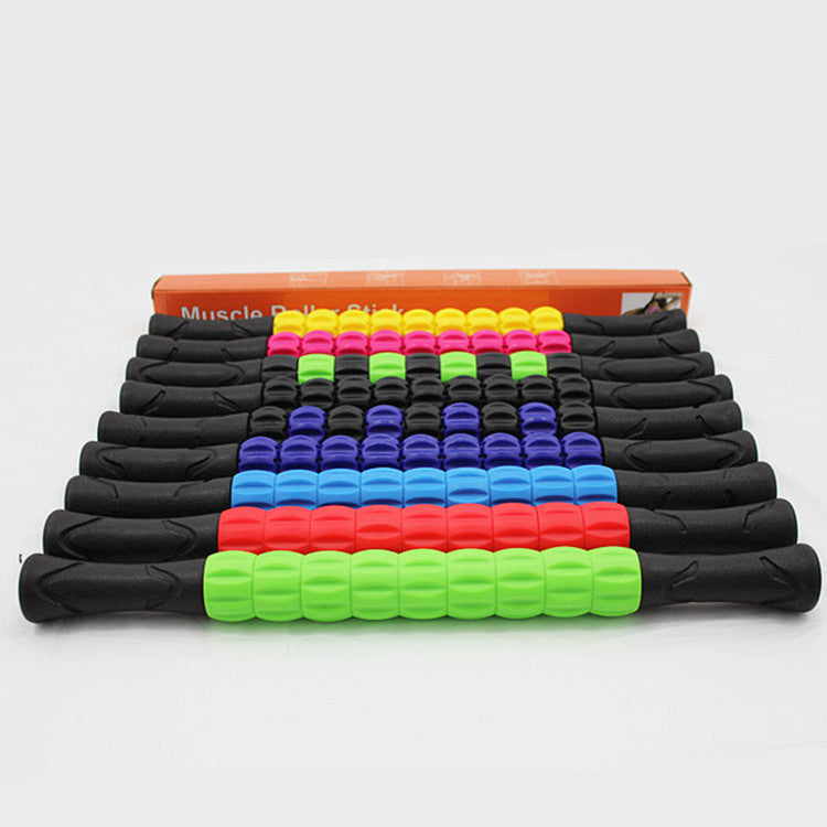 Stacked muscle massage sticks in black with colored roller beads: green, blue, red, purple, pink.
