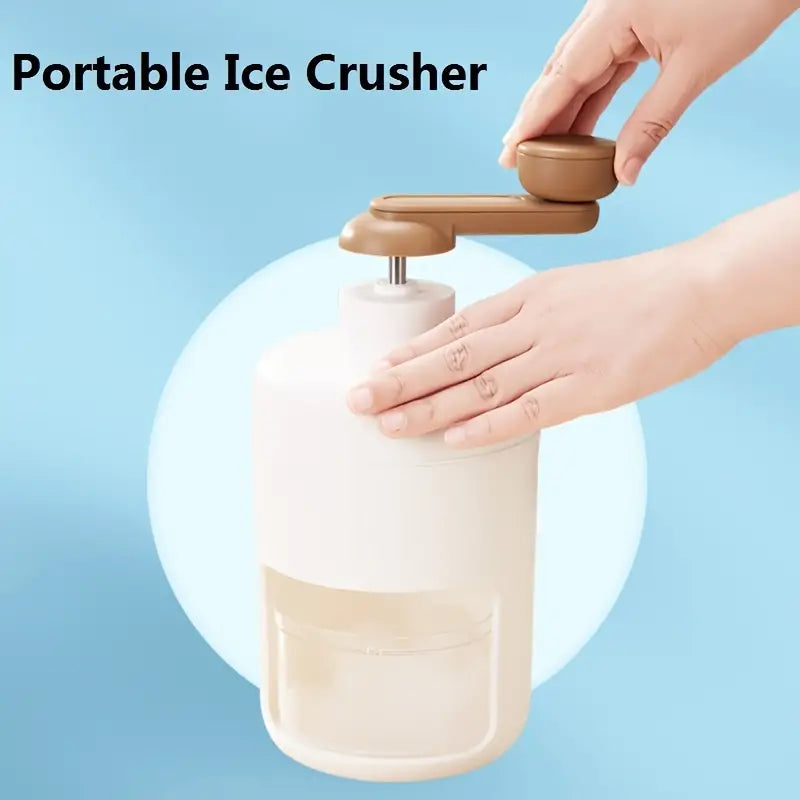 Portable ice crusher with hands on the brown crank handle above the clear container.