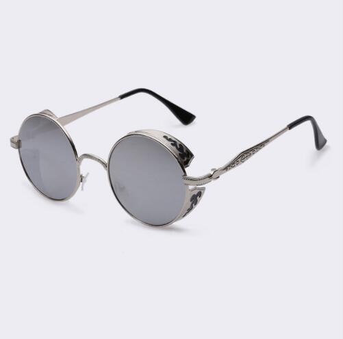Women’s round sunglasses with gray lenses and silver-toned frames, black temples