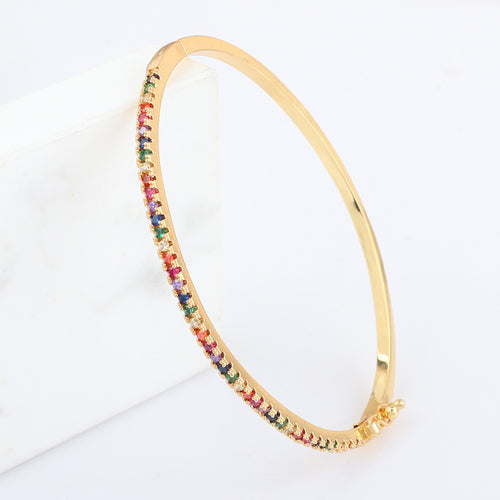 18k Gold bracelet with rainbow multicolor gemstone pave detail and clasp, side view