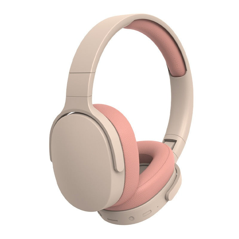 Apricot pink and light beige over-ear wireless noise cancelling headphones