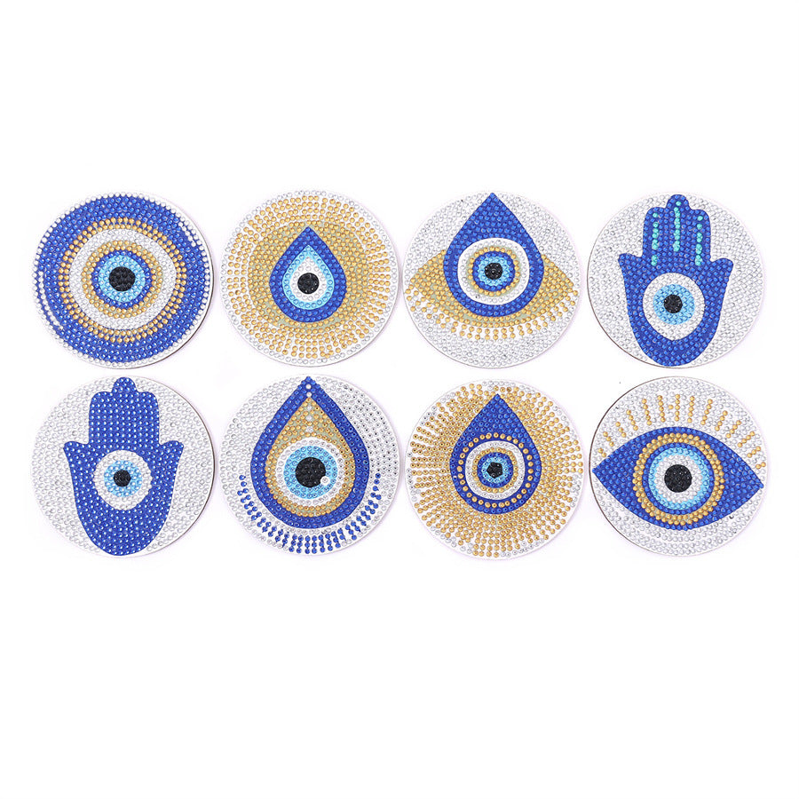 Set of 8 round diamond coasters, blue and gold eye and hamsa motifs