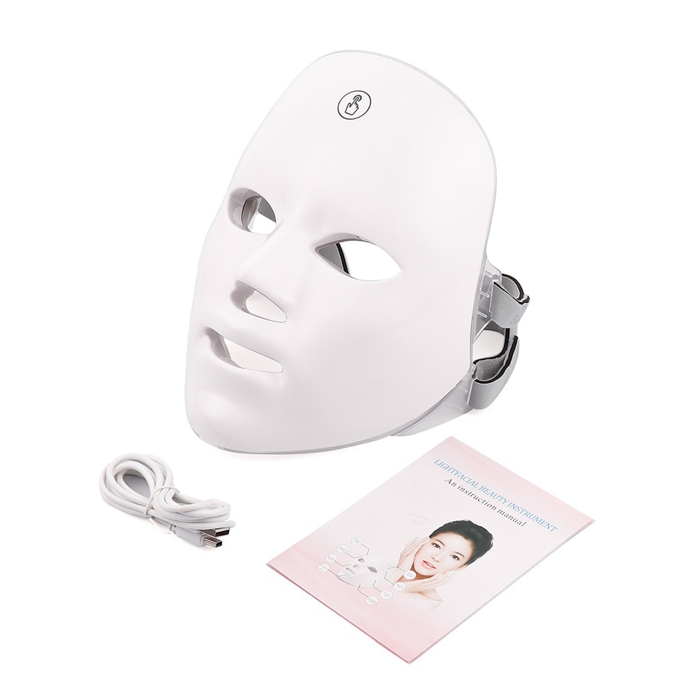 White LED facial mask with attached cable and printed instruction leaflet