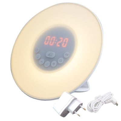 Cream round alarm clock radio with red time display and included power cord