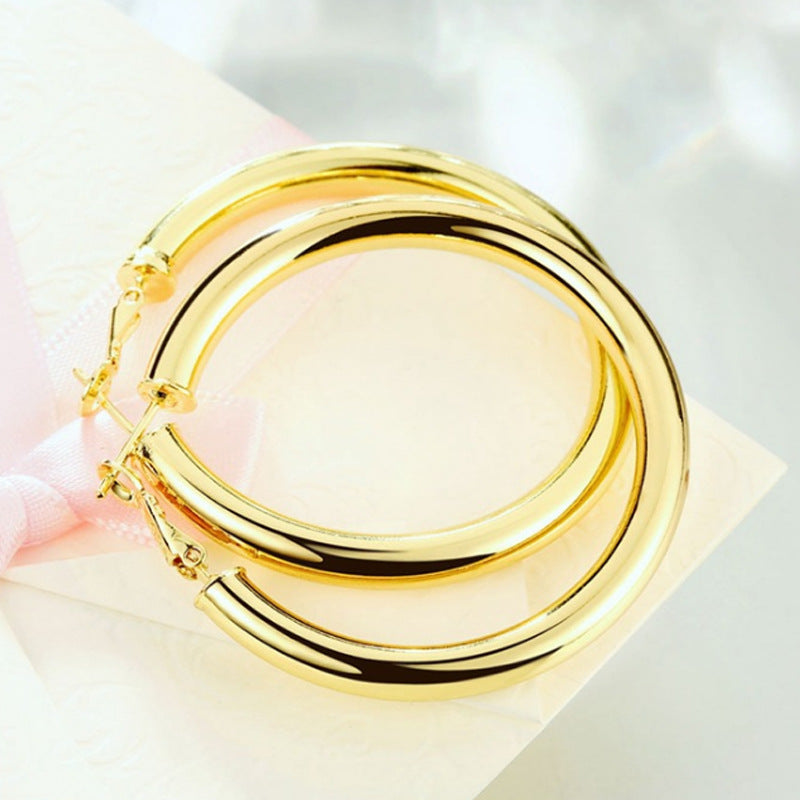 Vintage hollow hoop earrings, gold-tone round hoops with clasp details