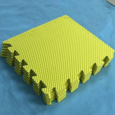 Lime green foam puzzle floor mat panels with interlocking edges