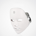 Luminous Skin Therapy Device: mascarilla facial blanca con correas y orificios faciales