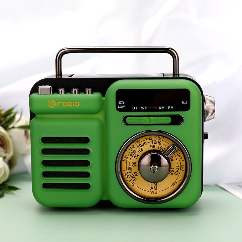 Grüner Retro-Solar Bluetooth-Lautsprecher mit goldener Skala und Drehregler