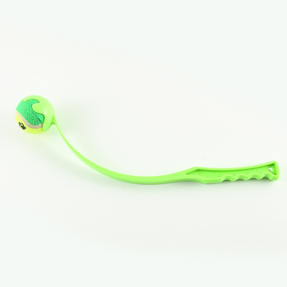 Green outdoor dog trainer launcher with neon green ball and paw print