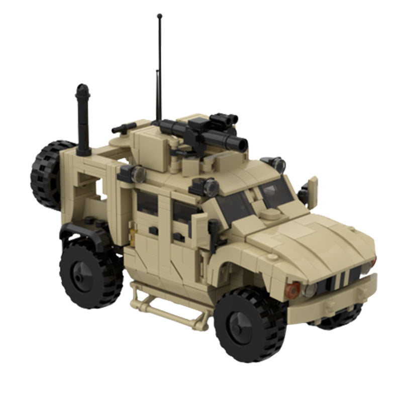 LEGO MRAP M-ATV model with tan hull, black machine gun, side windows and rugged tires