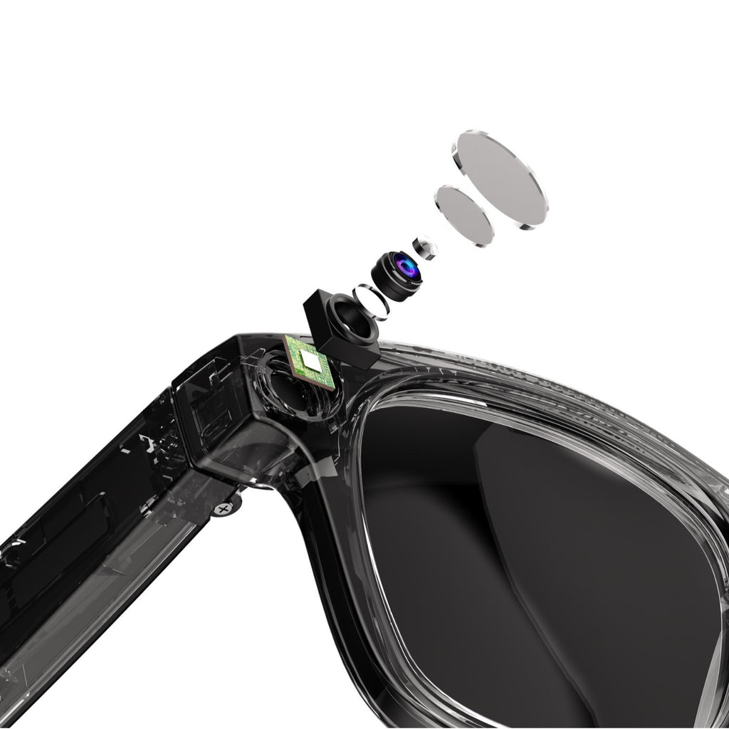 AI smart glasses camera module close-up with black housing and protective lens cover