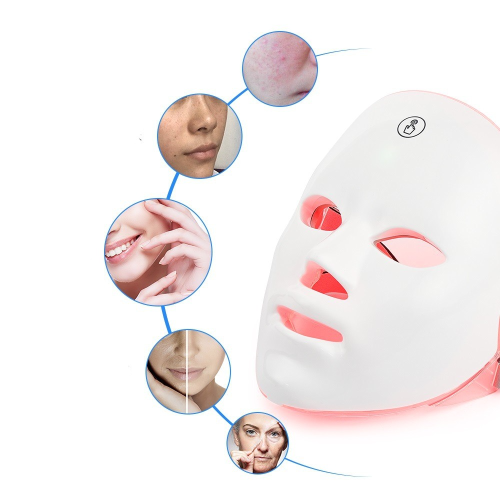 Skin rejuvenation LED mask with pink-red glowing modules and adjustable side strap