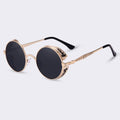 Women’s round sunglasses with dark lenses and rose-gold frames, black temples