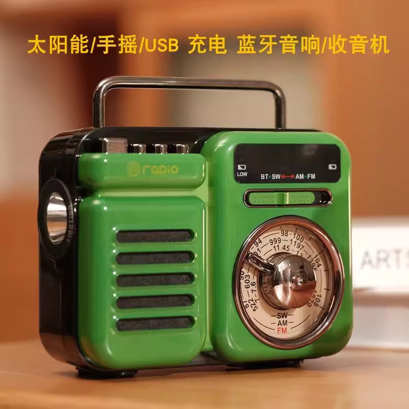 Grüner Retro-Solar Bluetooth-Lautsprecher mit Drehregler und Lautsprecheröffnungen