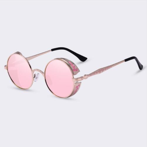 Women’s round sunglasses with pink lenses, rose-gold frames and black temples