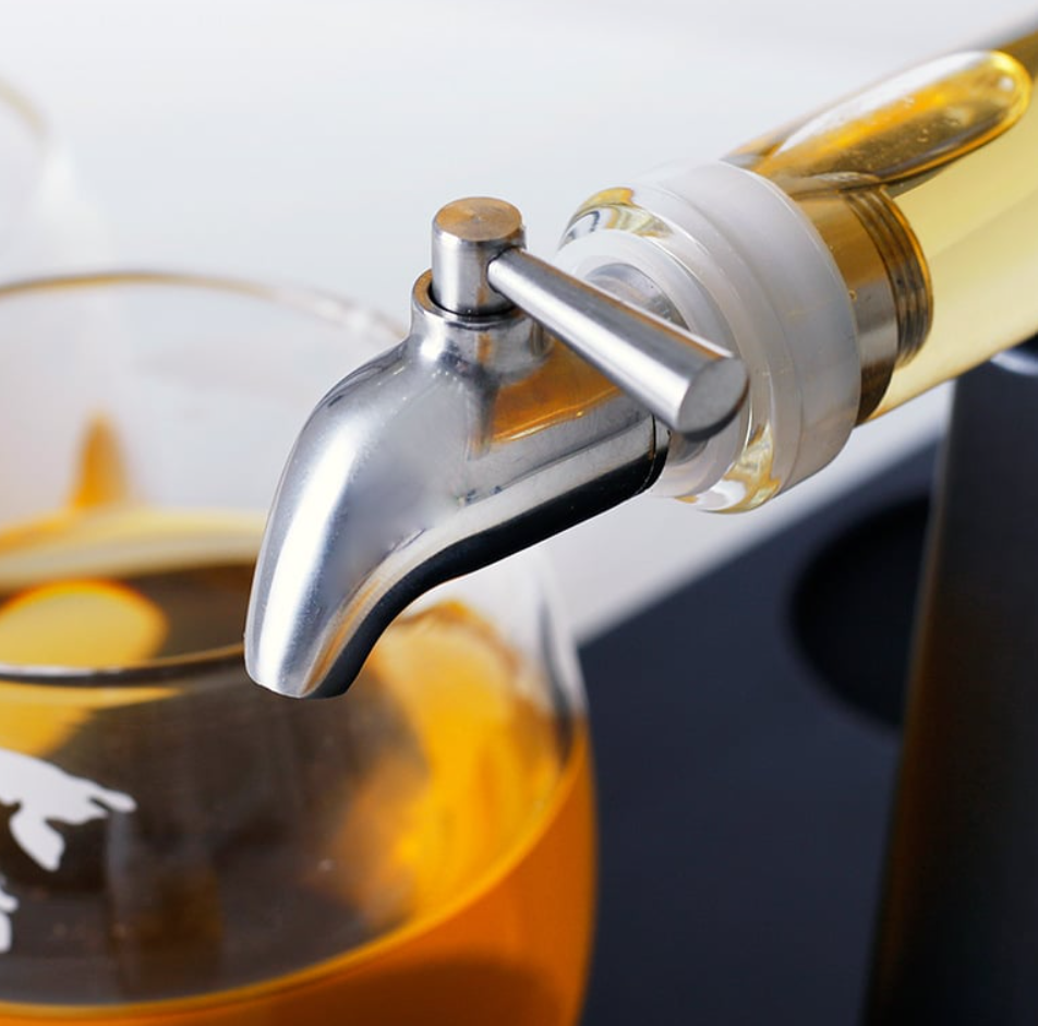 Glass wine dispenser spout and tap with bottle holder