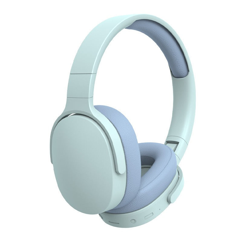 Light blue over-ear Bluetooth headphones with cushioned headband and ear pads
