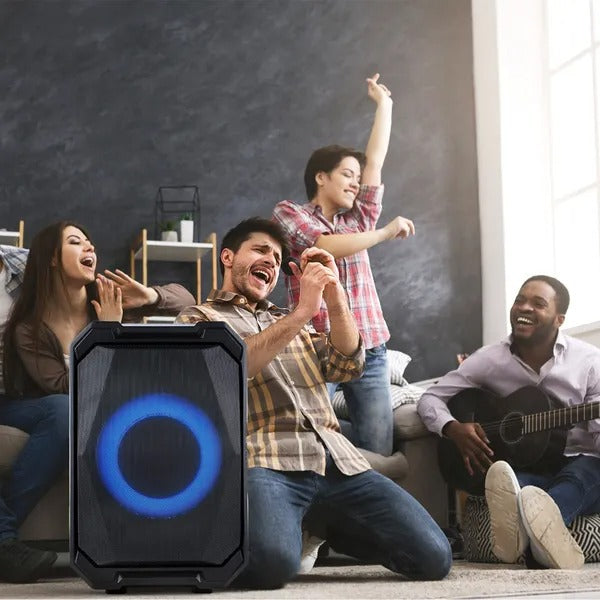 Black portable party speaker with two microphones, glowing LED ring light