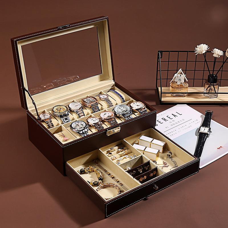 Brown jewelry and watch box open, watch grid and lower divided compartments