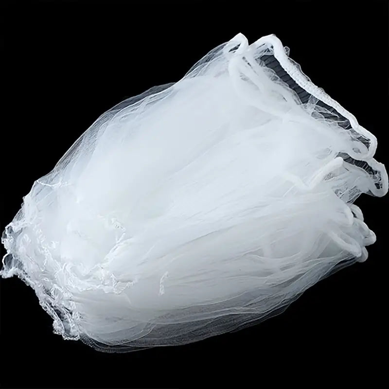 White mesh filter bag for straining rinsed ingredients, gathered tie handles