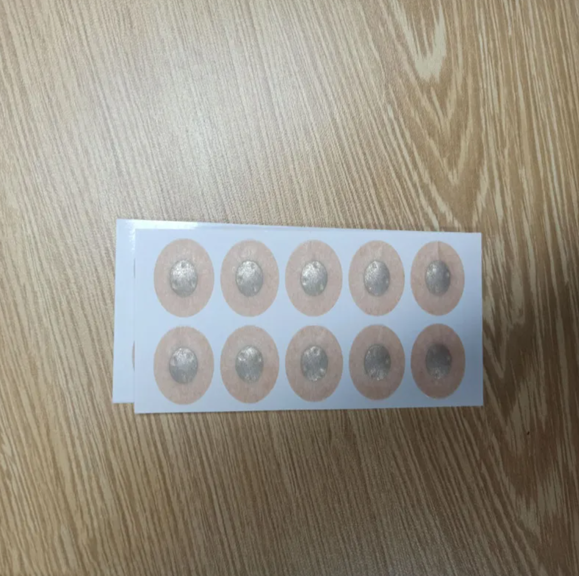 Breathe Easy Nasal Dilators nose patch sheet with multiple round adhesive pads.