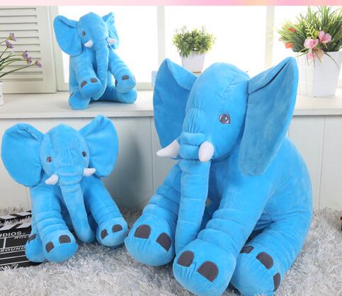 Blue plush elephant toy and pillow companion, wide ears and stitched eye