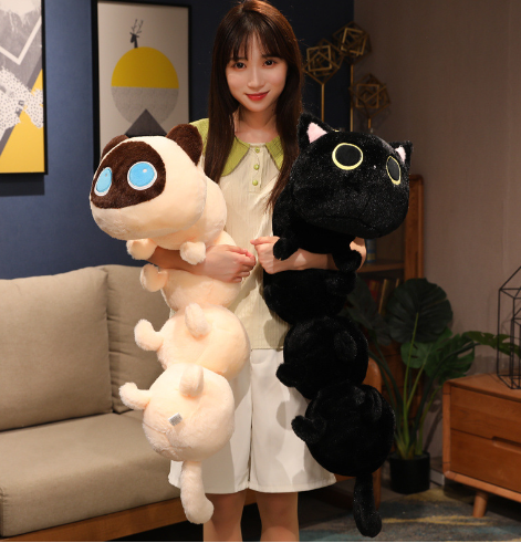 Cat plush pillows pair: white with blue eyes and brown ears, plus black with yellow eyes