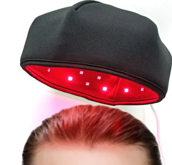 Dark grey hair helmet showing red light LEDs along the front rim