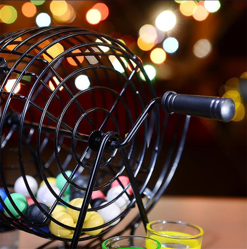 Close view of the rotating drum and handle on the black bingo lottery machine