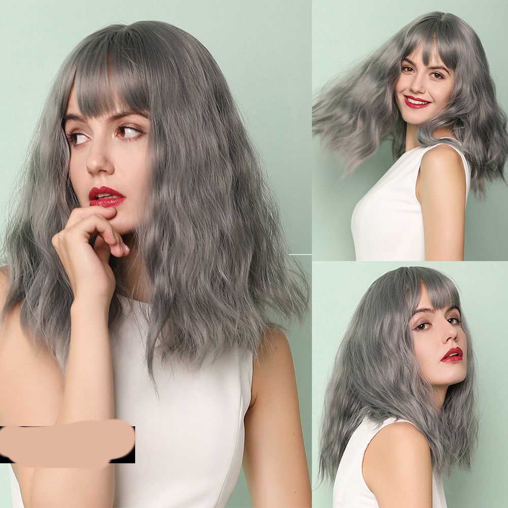 Short curly wig, ash gray with straight bangs and layered wavy hair