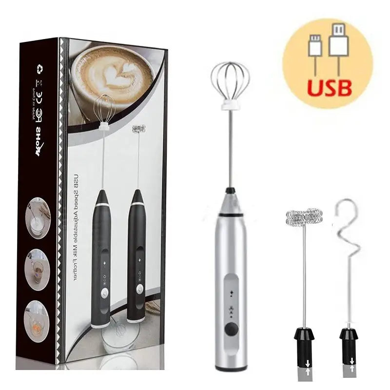 Silver USB rechargeable milk frother with two whisk heads and spare spring attachment
