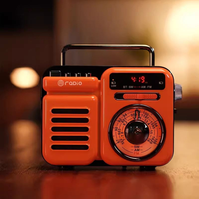 Oranger Retro-Solar Bluetooth-Lautsprecher mit Display und Drehregler